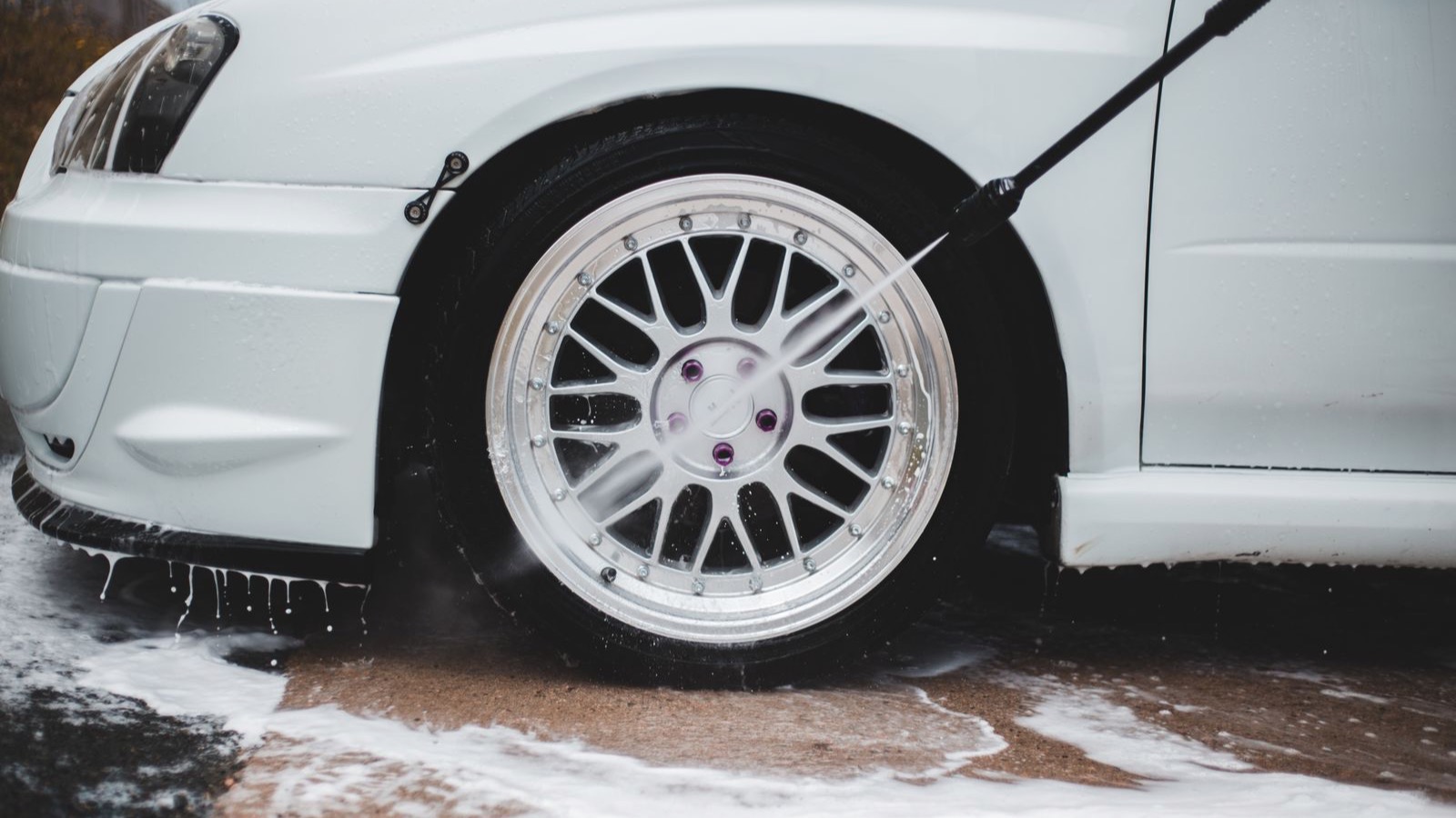 A wheel receiving a careful water rinse